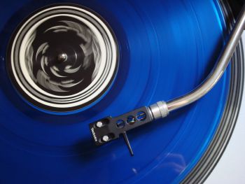 Blue Vinyl Record on Player